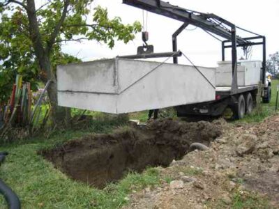 Conserving Water with a Rainwater Cistern Tank and Gravity Watering System Image